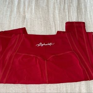 Red ALPHALETE leggings